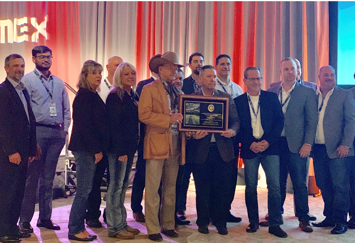 Bergeron Land Development’s SunTrax team accept the Best in Construction Award from the Florida Transportation Builders Association.